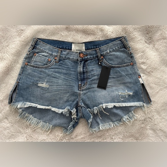 One Teaspoon Blue Distressed Jean Shorts
(Listing #36) - Picture 2 of 7
